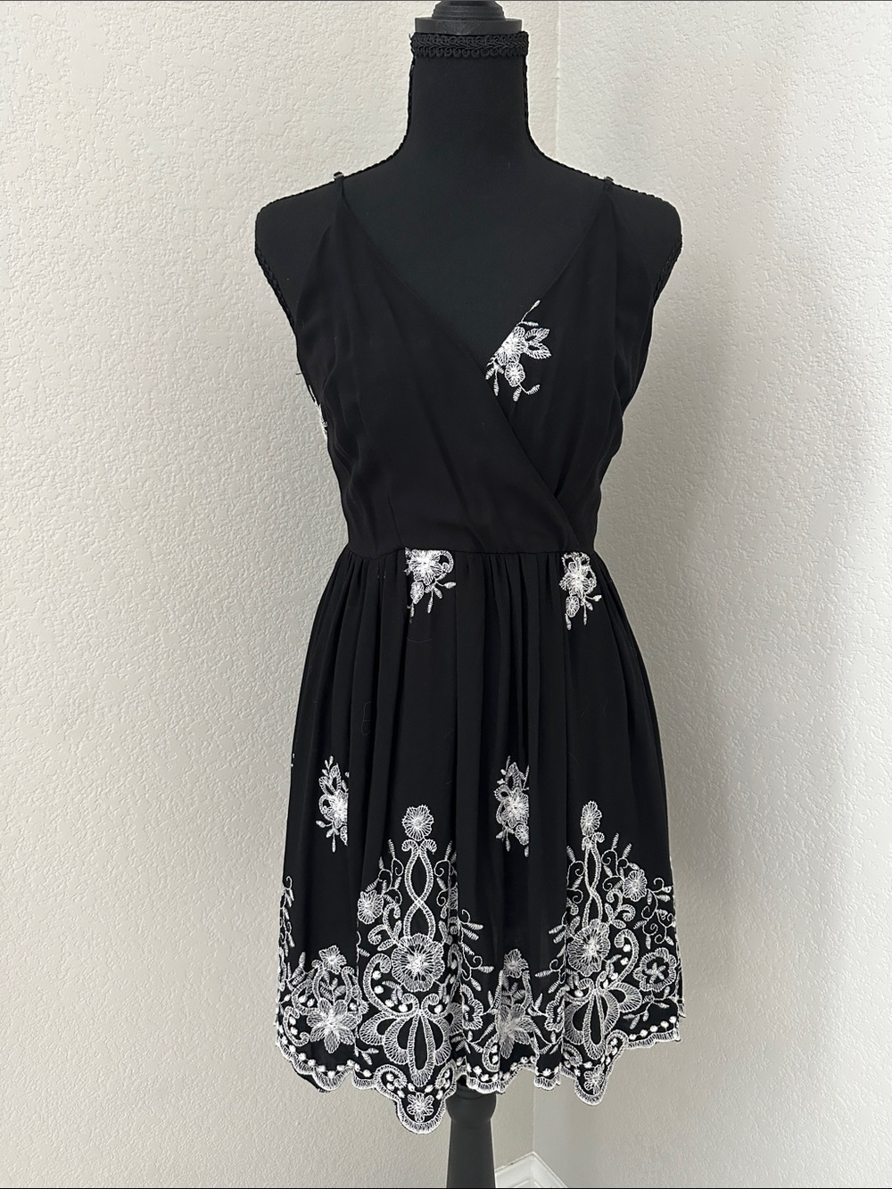 Romeo & Juliet Couture Black Mini Dress with White Floral Embroidery Accents